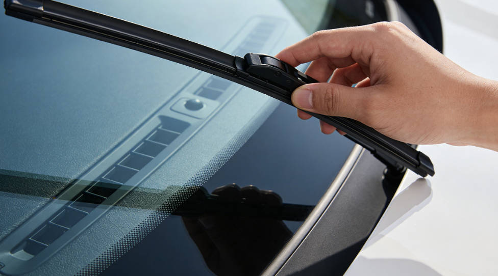 Lift the wiper arm away from the windshield