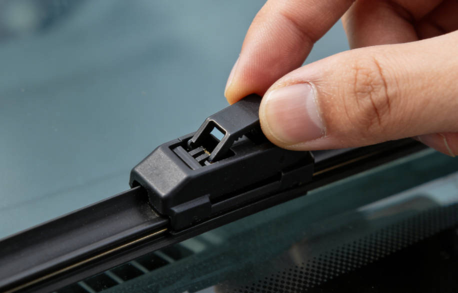 Press the release tab on the blade connector